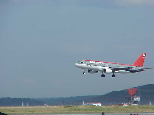 A Northwest jet about to land at Boston Logan International Airport