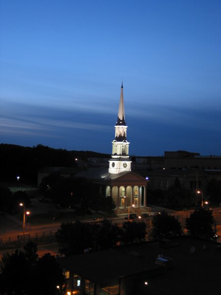 Illuminated Unitarian church steeple in Worcester Massachusetts