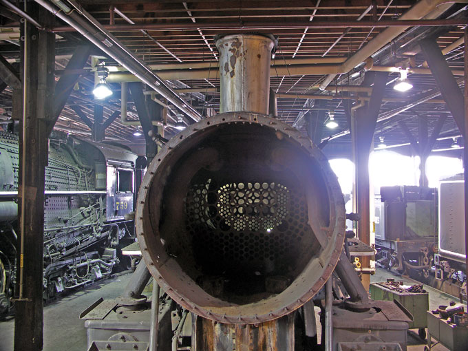 looking inside the shell of a steam locomotive in the Steamtown roundhouse