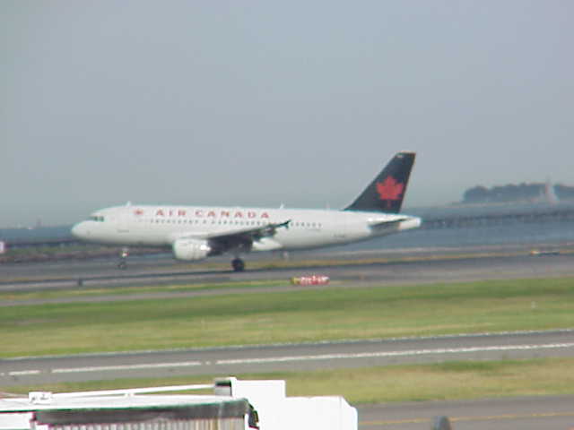 An Air Canada jets lands at Boston Logan International Airport