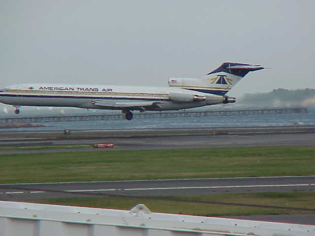 American Trans Air jet landing at Boston Logan International Airport