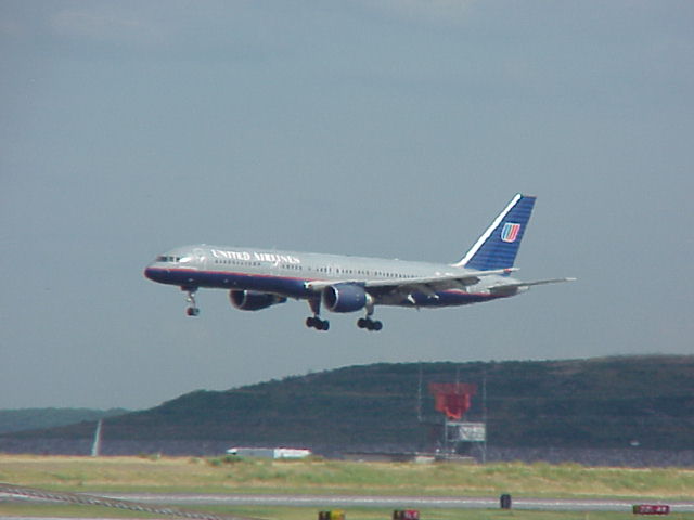 A United Airways jet appoaches a runway at Boston Logan International Airport
