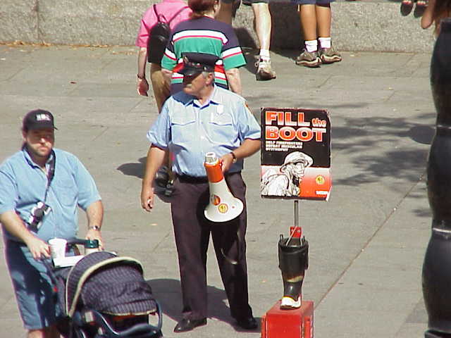A Boston firefighter working to get donations for the Fill the Boot