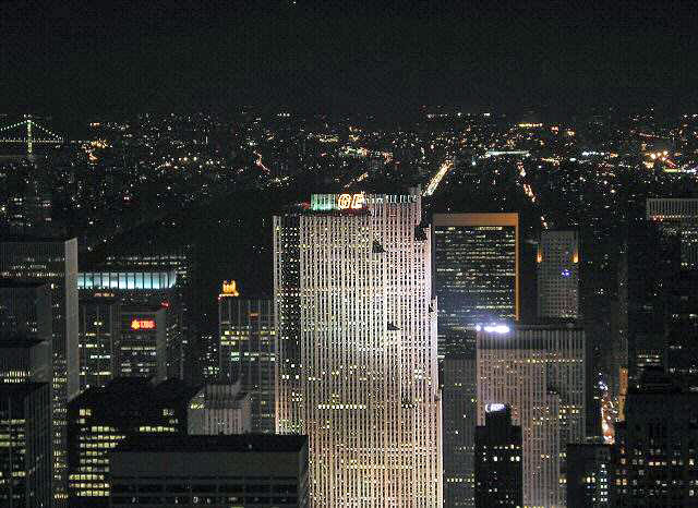 The top of the GE building ar night seen from the Empire State Building