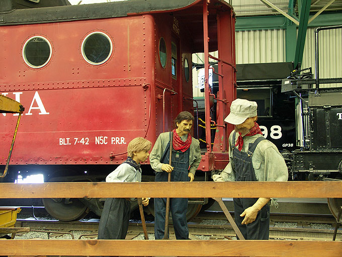 A crew workin on the rails