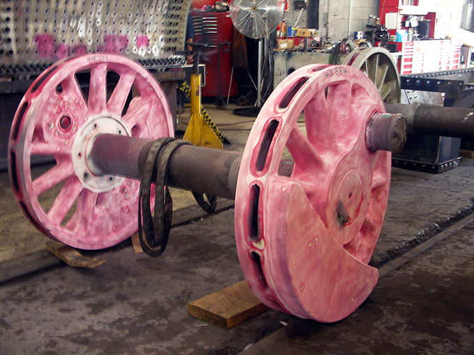 A locomotive axle and wheels inside the Steamtown shop